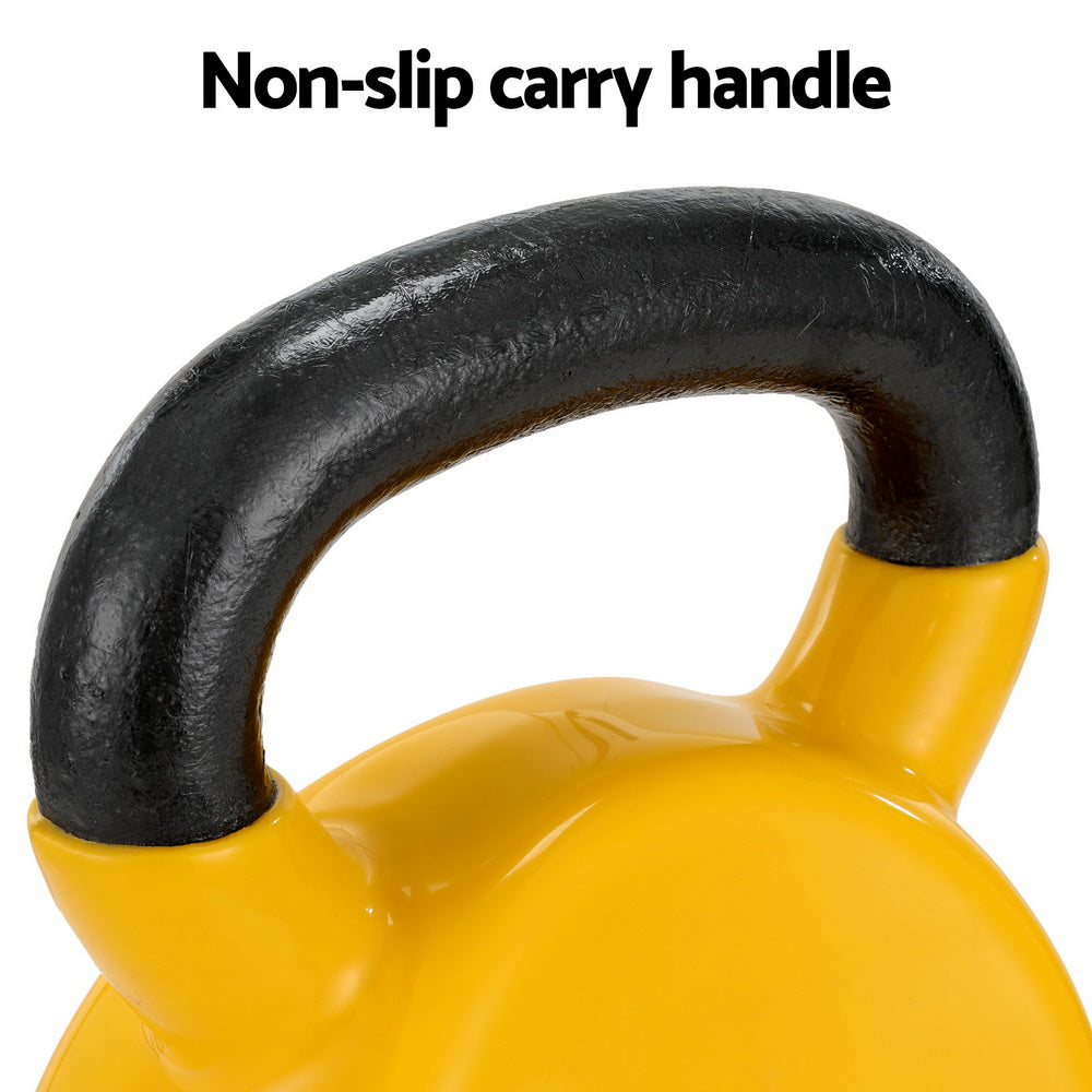 Yellow kettlebell with a black non-slip handle on a white background