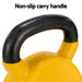 Yellow kettlebell with a black non-slip handle on a white background