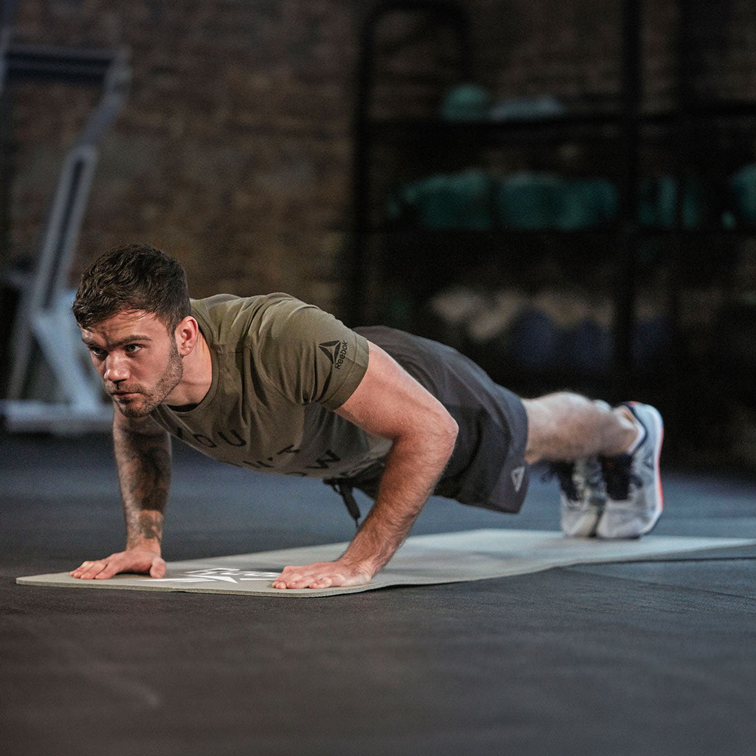 Man using mat for exercise 