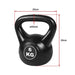 Black kettlebell with measurements on a white background