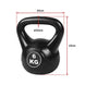 Black kettlebell with measurements on a white background
