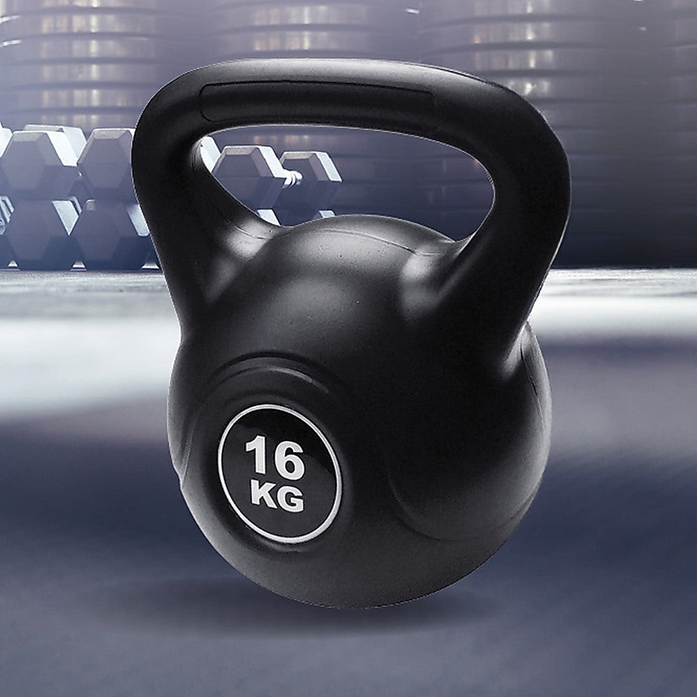 Black kettlebell with '16 KG' marking on a blurred gym background