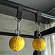 balls strapped to gym frame 