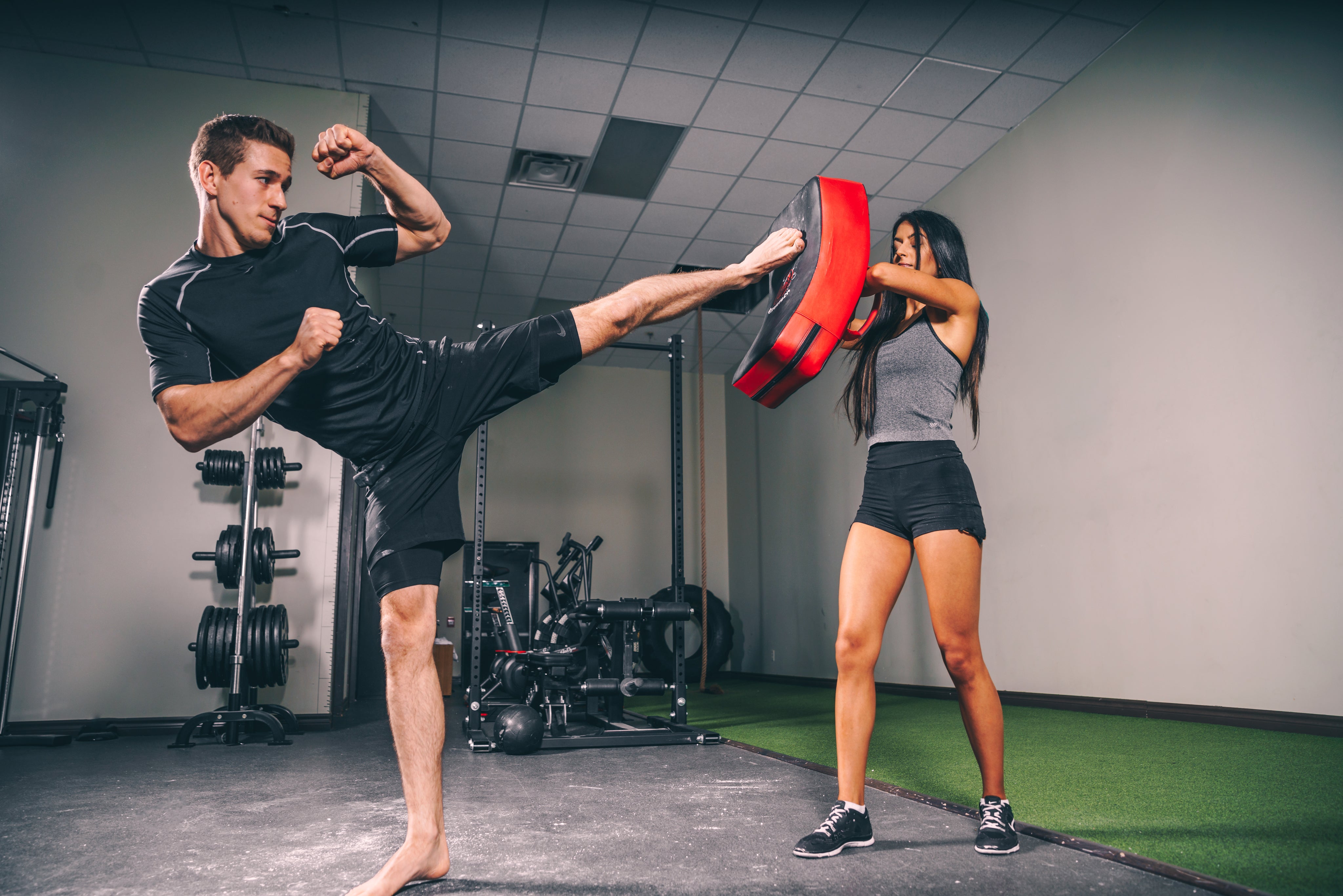 Man kicking bag 
